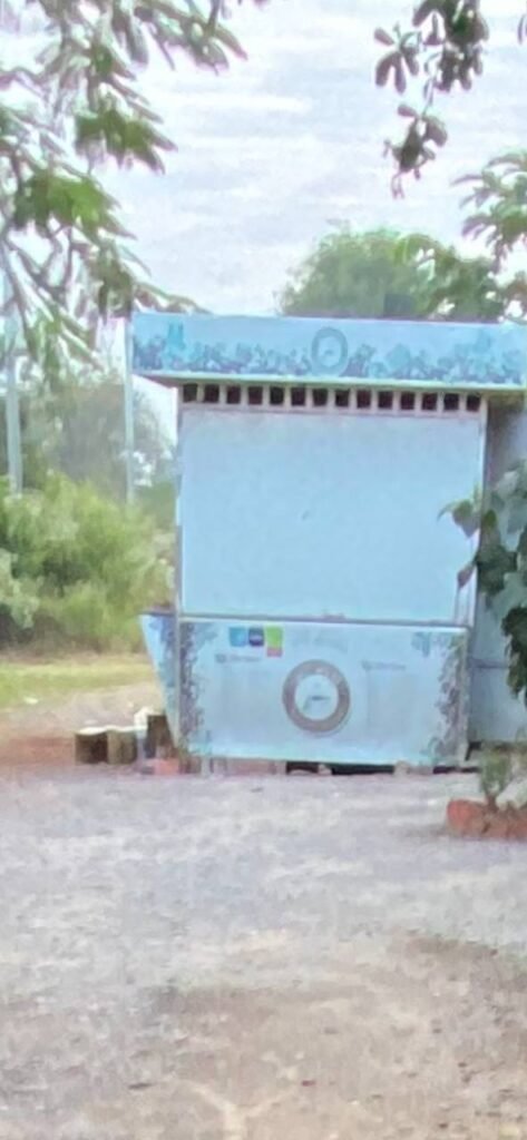 Abandoned blue coffee kiosk closed for business.