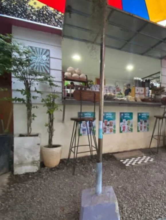 "Rebuilding: The Press Day Coffee operating today."