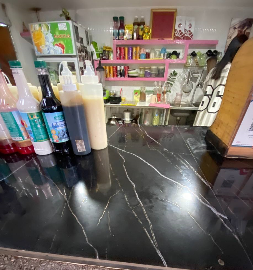 My shop isn't the biggest in town, but it's authentic. The colorful umbrellas of The Press Day Coffee.