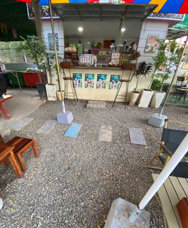 Outdoor coffee shop kiosk setup in Cambodia, The Press Day Coffee.